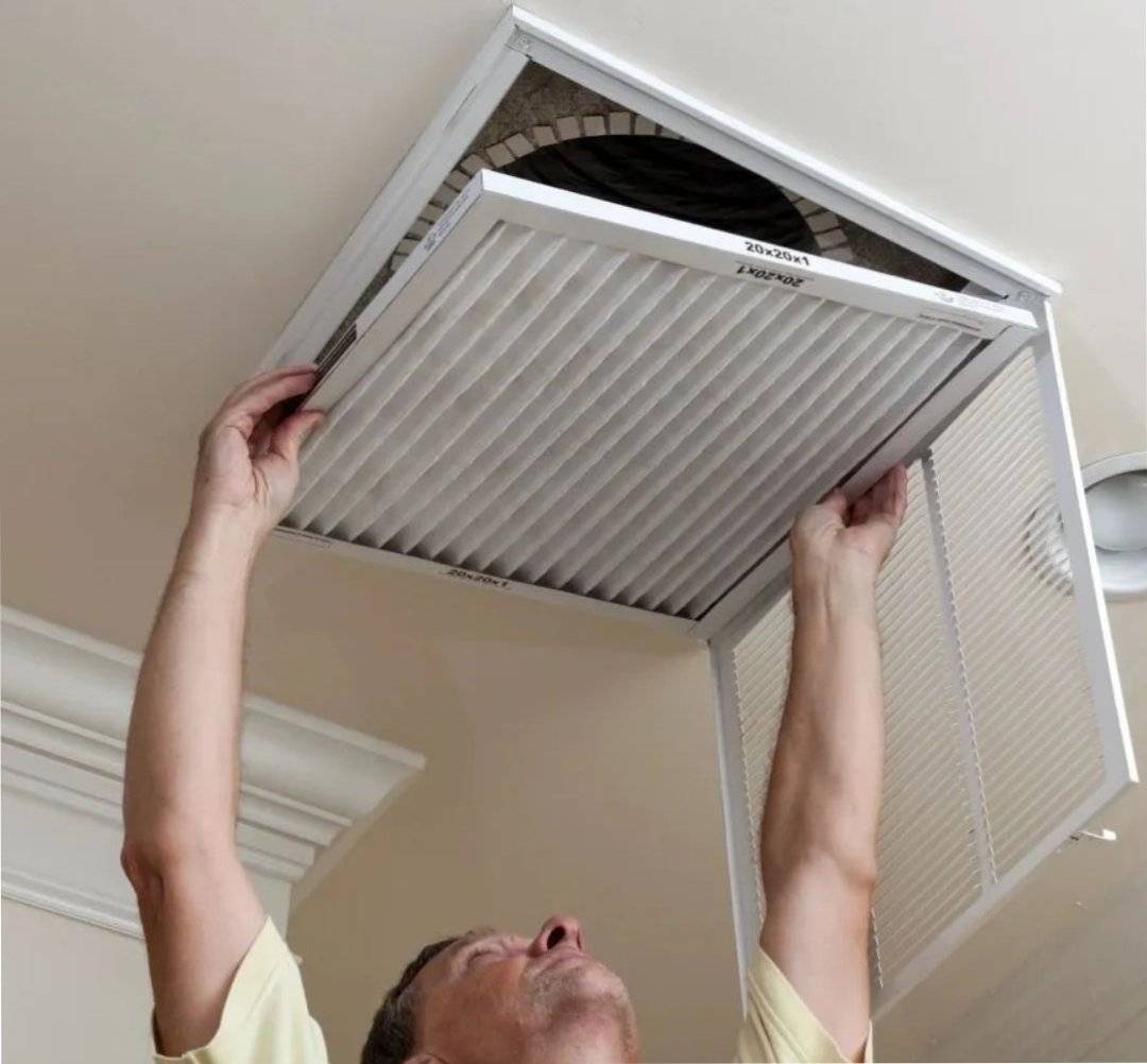 HVAC technician air conditioning ceiling maintenance